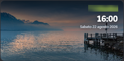 Il riquadro con il luogo, l'ora e una fotografia di paesaggio